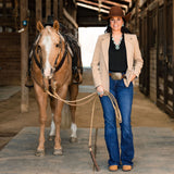 womens business western outfit with a palomino mare with romal reins
