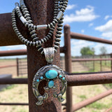Naja Pendants by Richard Yazzie