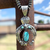 Naja Pendants by Richard Yazzie